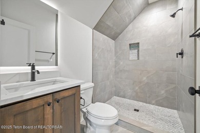 Discover elevated mountain living in this brand-new custom home on Teton Reserve in Idaho - for sale on GolfHomes.com, golf home, golf lot