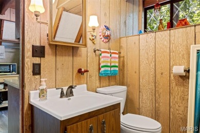 Welcome to your private woodland retreat at Innsbrook! Tucked on Innsbrook Resort Golf Course in Missouri - for sale on GolfHomes.com, golf home, golf lot