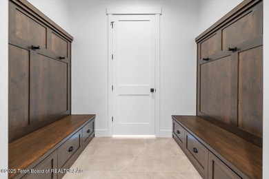 Discover elevated mountain living in this brand-new custom home on Teton Reserve in Idaho - for sale on GolfHomes.com, golf home, golf lot