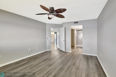 Enjoy the spectacular LAKE view from this beautiful and LARGE on Flamingo Lakes Country Club in Florida - for sale on GolfHomes.com, golf home, golf lot