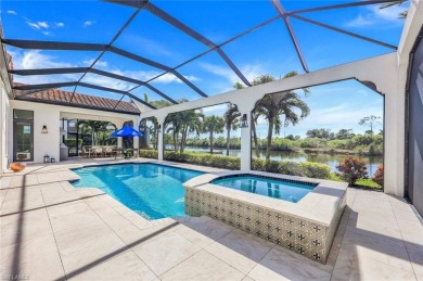 A RARE riverfront GEM with tranquil preserve, sunset views and on The Golf Club At Fiddlers Creek in Florida - for sale on GolfHomes.com, golf home, golf lot