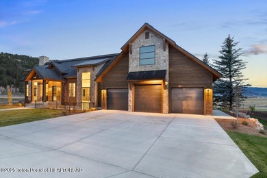 Discover elevated mountain living in this brand-new custom home on Teton Reserve in Idaho - for sale on GolfHomes.com, golf home, golf lot