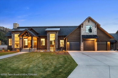 Discover elevated mountain living in this brand-new custom home on Teton Reserve in Idaho - for sale on GolfHomes.com, golf home, golf lot