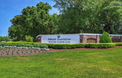 Welcome to 274 Masters Drive located on the 11th fairway of on Pawleys Plantation Golf and Country Club in South Carolina - for sale on GolfHomes.com, golf home, golf lot