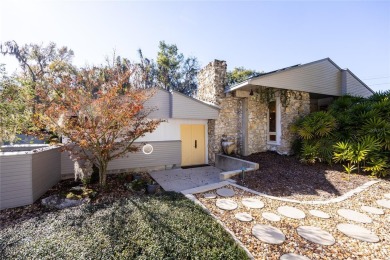 Extraordinary Mid-Century Modern home in the highly desired on Mark Bostick Golf Course At University of Florida in Florida - for sale on GolfHomes.com, golf home, golf lot