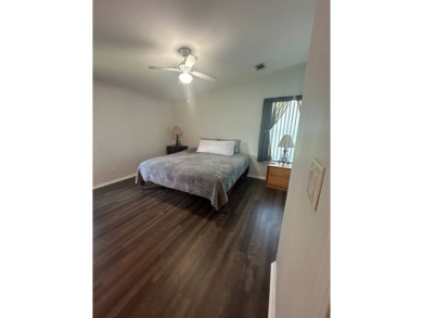 Rare Find! 2-Bedroom Palm Harbor Home with 2-Car Garage, Office on Schalamar Creek Golf and Country Club in Florida - for sale on GolfHomes.com, golf home, golf lot