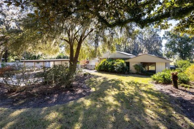 Extraordinary Mid-Century Modern home in the highly desired on Mark Bostick Golf Course At University of Florida in Florida - for sale on GolfHomes.com, golf home, golf lot