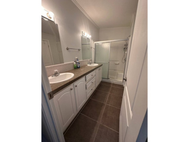 Rare Find! 2-Bedroom Palm Harbor Home with 2-Car Garage, Office on Schalamar Creek Golf and Country Club in Florida - for sale on GolfHomes.com, golf home, golf lot