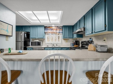 Stunning 2 bedroom/2 bathroom condo overlooking the golf course! on  in North Carolina - for sale on GolfHomes.com, golf home, golf lot