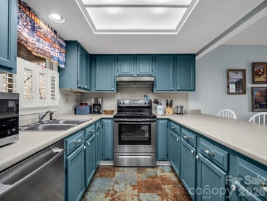 Stunning 2 bedroom/2 bathroom condo overlooking the golf course! on  in North Carolina - for sale on GolfHomes.com, golf home, golf lot