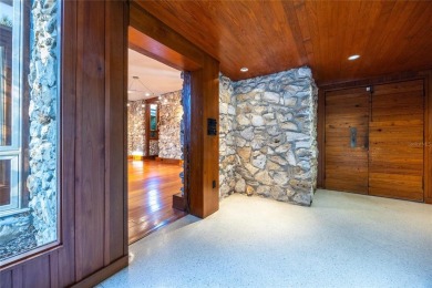 Extraordinary Mid-Century Modern home in the highly desired on Mark Bostick Golf Course At University of Florida in Florida - for sale on GolfHomes.com, golf home, golf lot