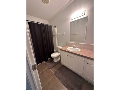 Rare Find! 2-Bedroom Palm Harbor Home with 2-Car Garage, Office on Schalamar Creek Golf and Country Club in Florida - for sale on GolfHomes.com, golf home, golf lot
