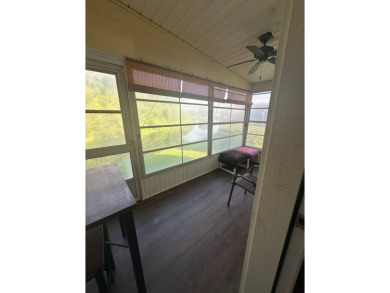 Rare Find! 2-Bedroom Palm Harbor Home with 2-Car Garage, Office on Schalamar Creek Golf and Country Club in Florida - for sale on GolfHomes.com, golf home, golf lot