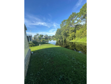 Rare Find! 2-Bedroom Palm Harbor Home with 2-Car Garage, Office on Schalamar Creek Golf and Country Club in Florida - for sale on GolfHomes.com, golf home, golf lot