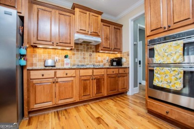 Welcome to this amazing home filled with southern charm nestled on Mirror Lake Golf Club in Georgia - for sale on GolfHomes.com, golf home, golf lot