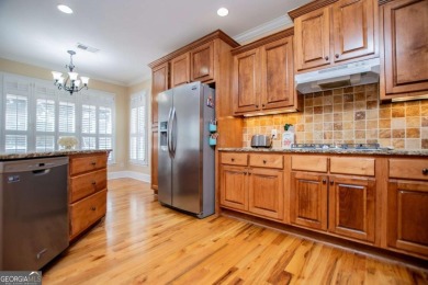 Welcome to this amazing home filled with southern charm nestled on Mirror Lake Golf Club in Georgia - for sale on GolfHomes.com, golf home, golf lot