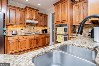 Welcome to this amazing home filled with southern charm nestled on Mirror Lake Golf Club in Georgia - for sale on GolfHomes.com, golf home, golf lot