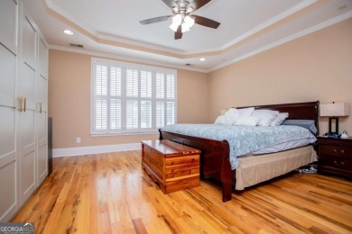 Welcome to this amazing home filled with southern charm nestled on Mirror Lake Golf Club in Georgia - for sale on GolfHomes.com, golf home, golf lot