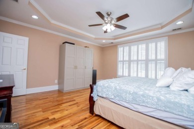 Welcome to this amazing home filled with southern charm nestled on Mirror Lake Golf Club in Georgia - for sale on GolfHomes.com, golf home, golf lot