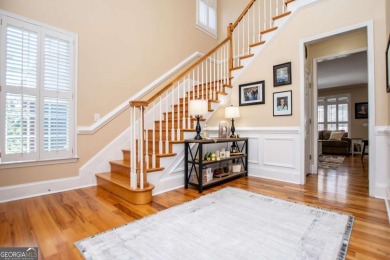 Welcome to this amazing home filled with southern charm nestled on Mirror Lake Golf Club in Georgia - for sale on GolfHomes.com, golf home, golf lot