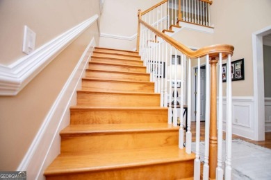 Welcome to this amazing home filled with southern charm nestled on Mirror Lake Golf Club in Georgia - for sale on GolfHomes.com, golf home, golf lot