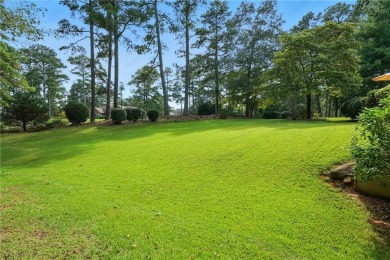 Enjoy country club living in this beautifully updated 3-bedroom on Fairfield Plantation Golf and Country Club in Georgia - for sale on GolfHomes.com, golf home, golf lot