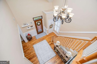 Welcome to this amazing home filled with southern charm nestled on Mirror Lake Golf Club in Georgia - for sale on GolfHomes.com, golf home, golf lot