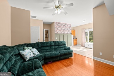 Welcome to this amazing home filled with southern charm nestled on Mirror Lake Golf Club in Georgia - for sale on GolfHomes.com, golf home, golf lot