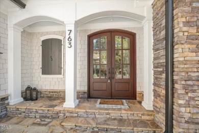 Experience refined living at 763 Heritage Arbor Drive, a on Heritage Golf Club in North Carolina - for sale on GolfHomes.com, golf home, golf lot