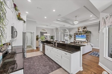 Welcome to your own slice of paradise in Rotonda Heights! This on Rotonda Golf and Country Club The Palms Course in Florida - for sale on GolfHomes.com, golf home, golf lot