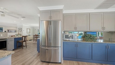 Welcome to Jacaranda West, where this premier peninsula homesite on Jacaranda West Country Club in Florida - for sale on GolfHomes.com, golf home, golf lot