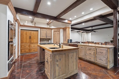 Waterfront luxury on Ridge Road in the gated community of The on The Coves Golf Course in Oklahoma - for sale on GolfHomes.com, golf home, golf lot