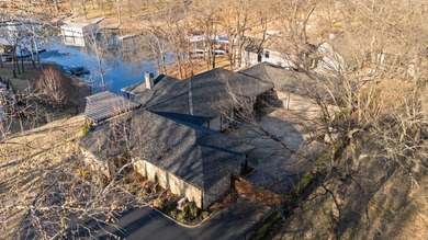 Waterfront luxury on Ridge Road in the gated community of The on The Coves Golf Course in Oklahoma - for sale on GolfHomes.com, golf home, golf lot