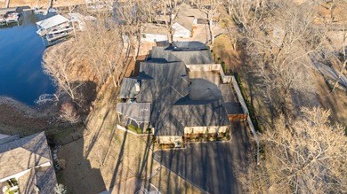 Waterfront luxury on Ridge Road in the gated community of The on The Coves Golf Course in Oklahoma - for sale on GolfHomes.com, golf home, golf lot