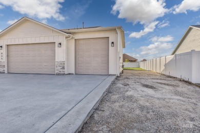 This FOUR BEDROOM home is placed perfectly on a corner lot for on Scotch Pines Golf Course in Idaho - for sale on GolfHomes.com, golf home, golf lot