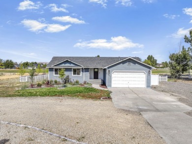 This charming 3-bedroom, 2-bathroom home, built in 1996, has on Spring Creek Golf Course in Nevada - for sale on GolfHomes.com, golf home, golf lot