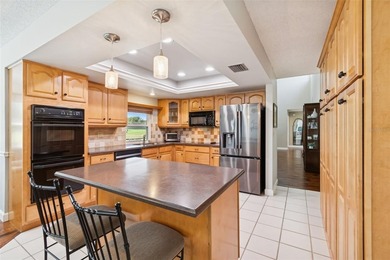 Beautiful golf course home in the heart of the highly sought on Orange Tree Golf Club in Florida - for sale on GolfHomes.com, golf home, golf lot