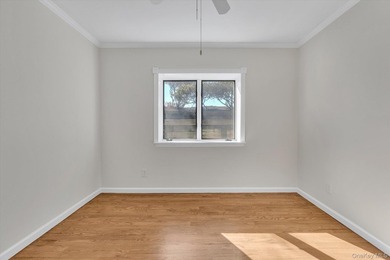 This sun-drenched 2-bedroom, 2-bathroom condo offers on Baiting Hollow Club in New York - for sale on GolfHomes.com, golf home, golf lot