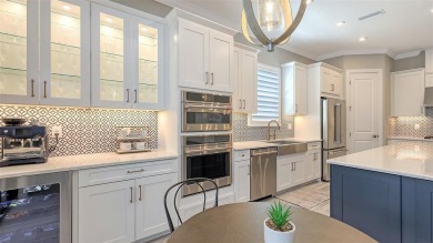 Under contract-accepting backup offers. Incredibly custom and on Esplanade Golf and Country at Lakewood Ranch in Florida - for sale on GolfHomes.com, golf home, golf lot
