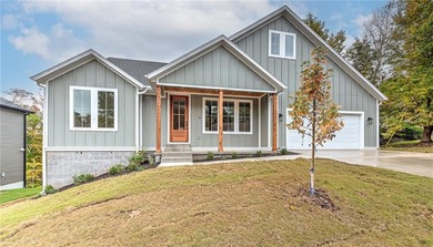 Discover elevated living in this meticulously maintained on Bella Vista - Metfield Golf Complex and Country Club in Arkansas - for sale on GolfHomes.com, golf home, golf lot