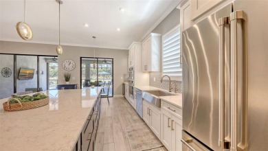 Under contract-accepting backup offers. Incredibly custom and on Esplanade Golf and Country at Lakewood Ranch in Florida - for sale on GolfHomes.com, golf home, golf lot