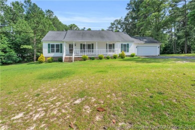 MOVE IN READY HOME WITH A VIEW OF THE DRIVING RANGE , 10TH HOLE on Quail Ridge Golf Course in North Carolina - for sale on GolfHomes.com, golf home, golf lot