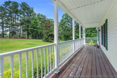 MOVE IN READY HOME WITH A VIEW OF THE DRIVING RANGE , 10TH HOLE on Quail Ridge Golf Course in North Carolina - for sale on GolfHomes.com, golf home, golf lot