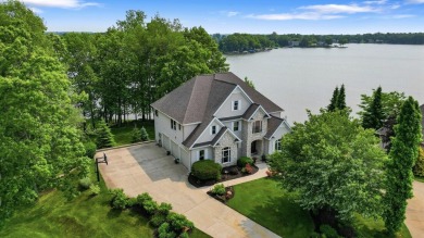 Comfortable and welcoming with 260 feet of water frontage, and on Island Hills Golf Club in Michigan - for sale on GolfHomes.com, golf home, golf lot