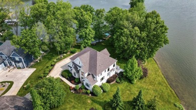 Comfortable and welcoming with 260 feet of water frontage, and on Island Hills Golf Club in Michigan - for sale on GolfHomes.com, golf home, golf lot