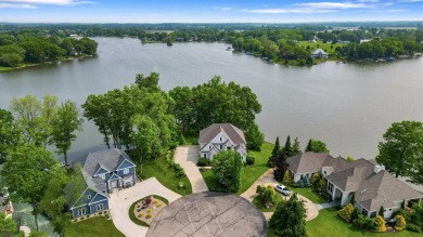 Comfortable and welcoming with 260 feet of water frontage, and on Island Hills Golf Club in Michigan - for sale on GolfHomes.com, golf home, golf lot