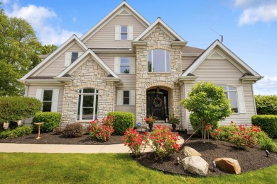 Comfortable and welcoming with 260 feet of water frontage, and on Island Hills Golf Club in Michigan - for sale on GolfHomes.com, golf home, golf lot