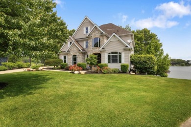 Comfortable and welcoming with 260 feet of water frontage, and on Island Hills Golf Club in Michigan - for sale on GolfHomes.com, golf home, golf lot