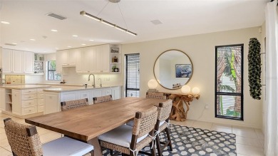 Coastal elegance meets island living in Bay Isles Bayou on on Longboat Key Golf Club Resort in Florida - for sale on GolfHomes.com, golf home, golf lot