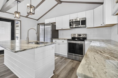 Enjoy the Hot Springs Village lifestyle with seasonal views of on DeSoto Golf Course in Arkansas - for sale on GolfHomes.com, golf home, golf lot